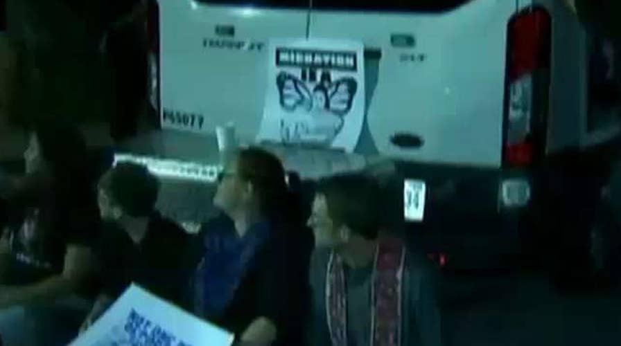 Protestors block ICE van after illegal immigrant arrested