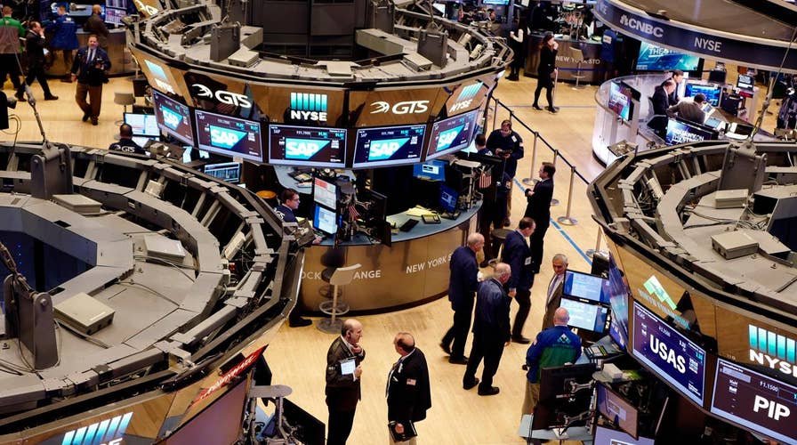 Stock markets hit record high after Trump promises tax cuts