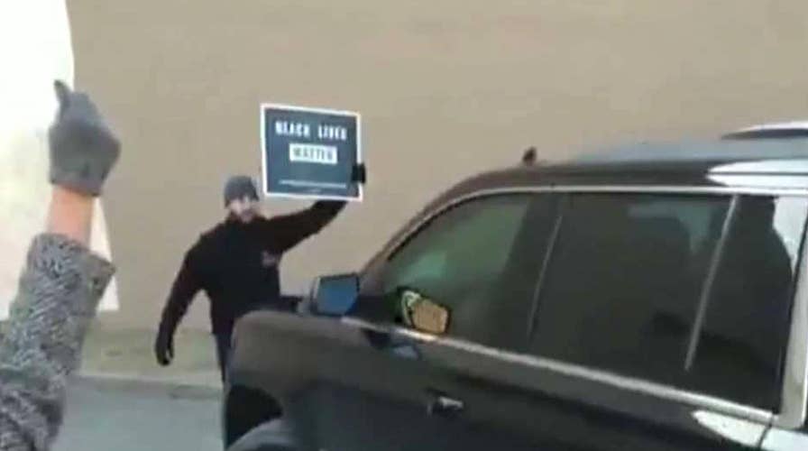 Protesters greet DeVos at DC school with shouts of 'shame'