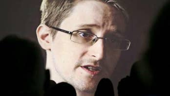 Snowden uses report that Russia may turn him over as proof he is not spy