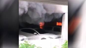 7 people treated, 8 cars burn in Disneyland parking fire
