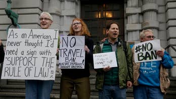 Trump seeks to end legal fight with revised travel ban