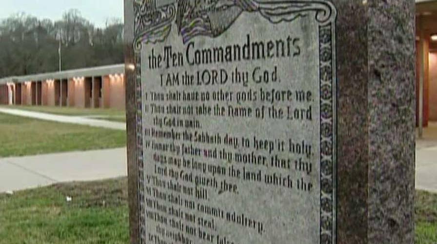 Atheist forces school to remove Ten Commandments monument