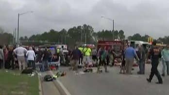 SUV plows into Alabama Mardi Gras parade crowd; high school band members hurt