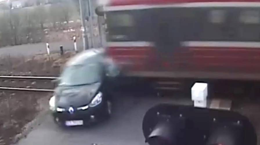 Moment of impact: Driver tries to beat speeding train, loses