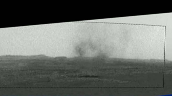 Dust devil spotted whirling across Mars' surface