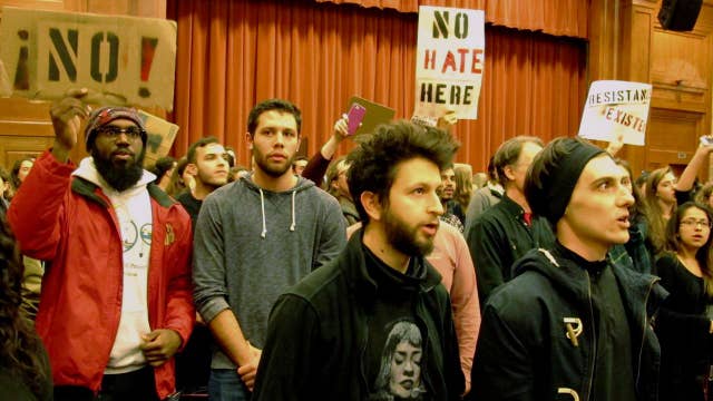 Protesters confront scholar at Middlebury College