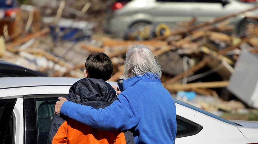 Tornado-ravaged community fears new threat: looters