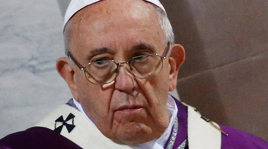 Pope Francis signals openness to ordaining married priests