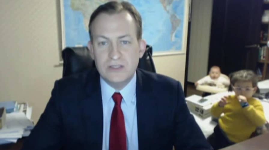 Children interrupt dad's interview on live TV