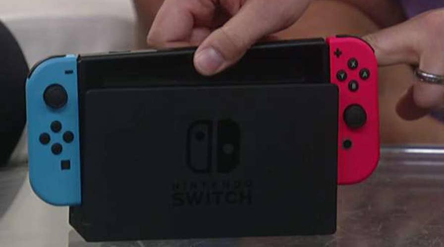 Nintendo executive demonstrates the Nintendo Switch