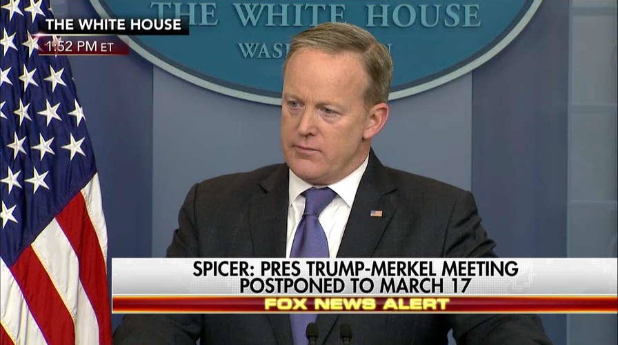 Spicer battles reporter on Trump claims