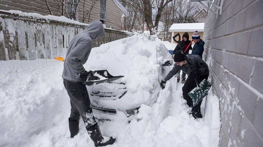 Blizzard brings extreme snowfall totals, grounds flights 