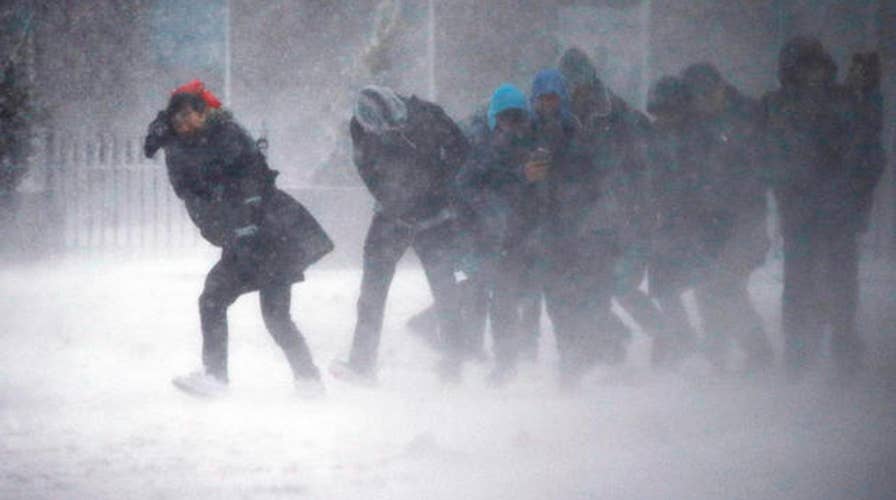 Winter storm dumps snow, ice on Northeast states