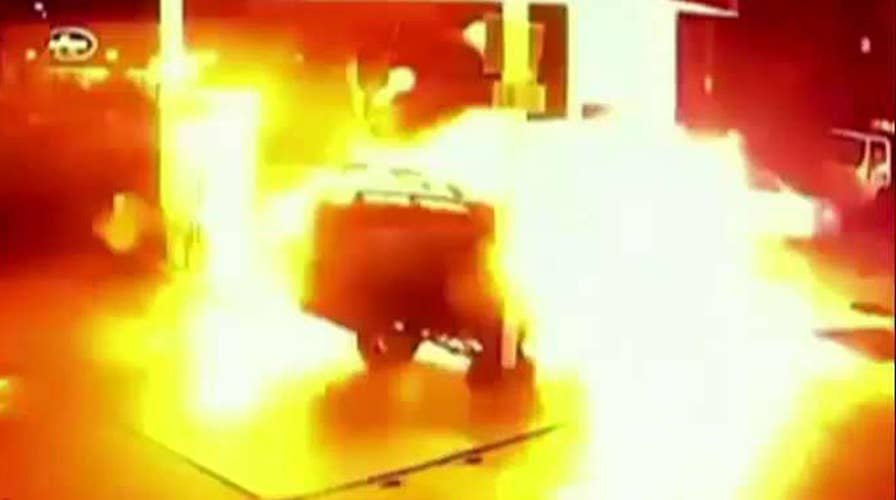 Fiery explosion after Uber driver crashes into gas pump