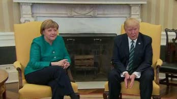 Trump presses Merkel 'hard' on NATO dues during visit