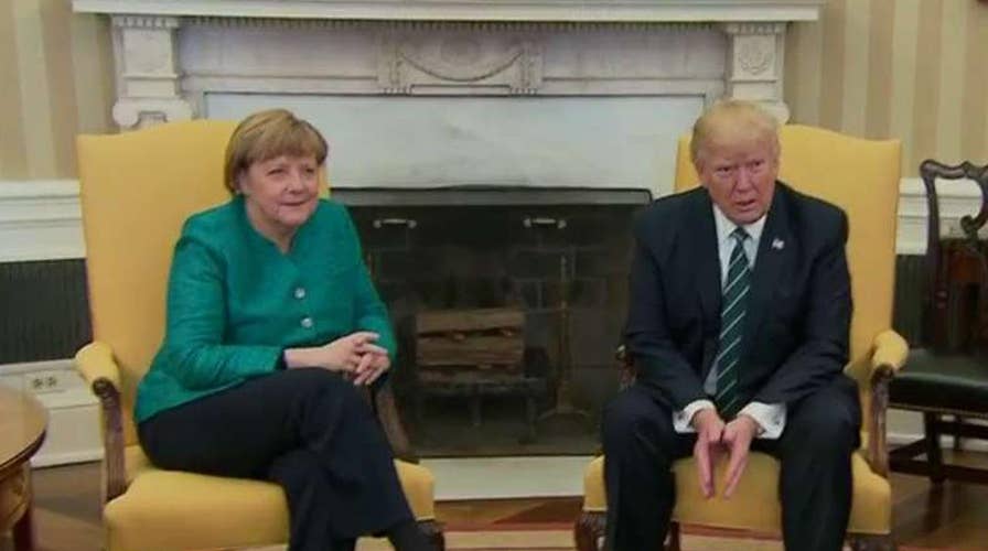Handshake missing from Trump-Merkel photo op?