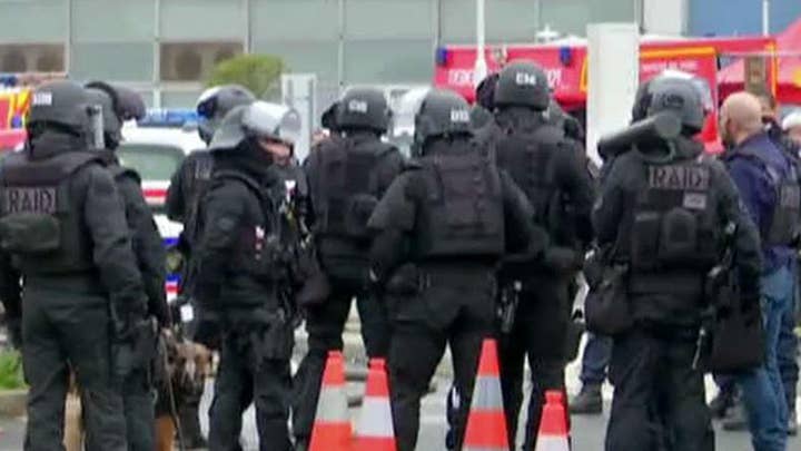 Suspected terrorist attacks airport in Paris