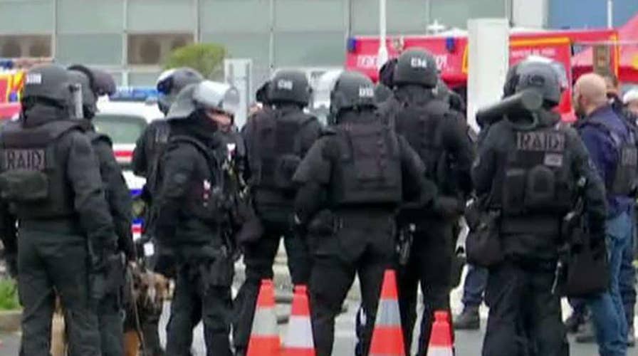 Suspected terrorist attacks airport in Paris
