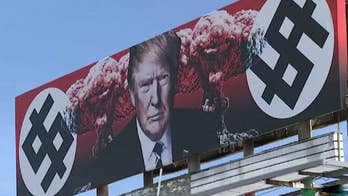Artist defends anti-Trump billboard