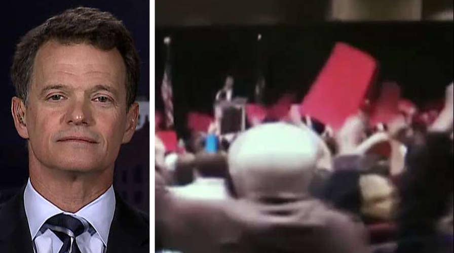 Rep. David Trott faces angry crowd at town hall event