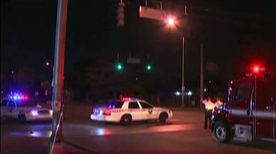 Two undercover police officers shot in 'ambush style' attack