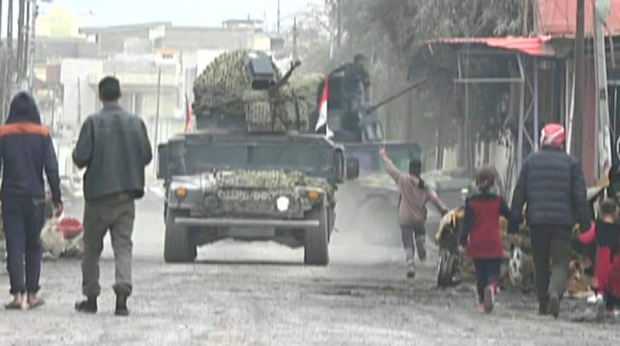 Geography, civilian casualties slow push to recapture Mosul