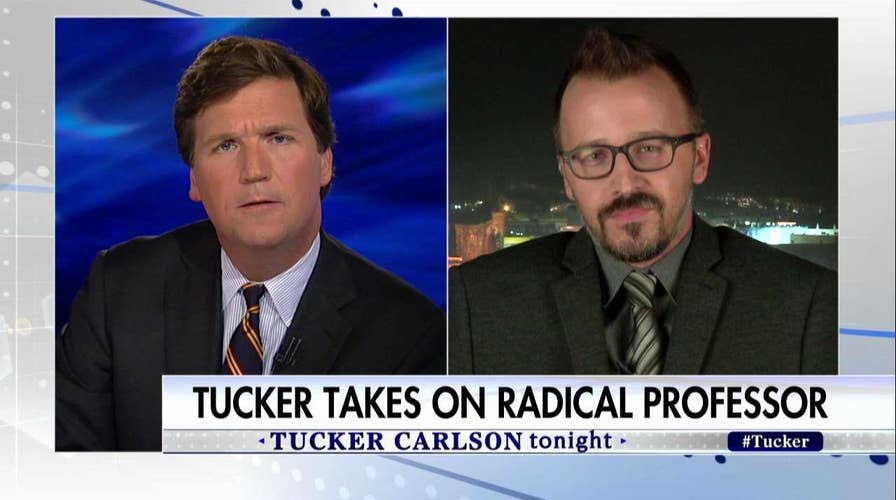 Tucker takes on radical professor