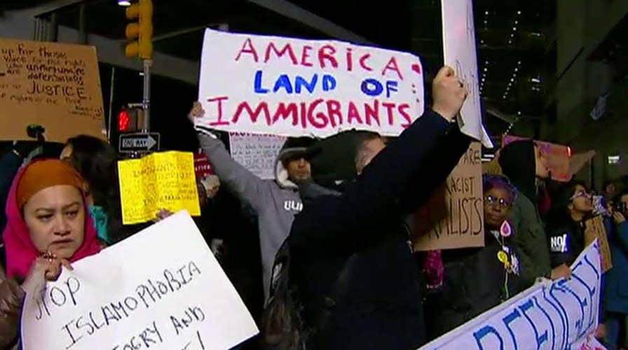 Trump administration appeals ruling blocking travel ban