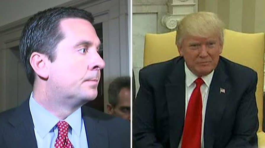 Sources: Trump, associates surveilled for up to year