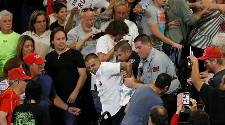 Fighting words? Judge OKs protesters' lawsuit against Trump