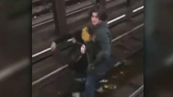 Hero saves boy from NY subway tracks