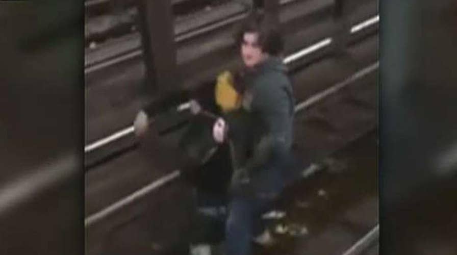 Hero saves boy from NY subway tracks
