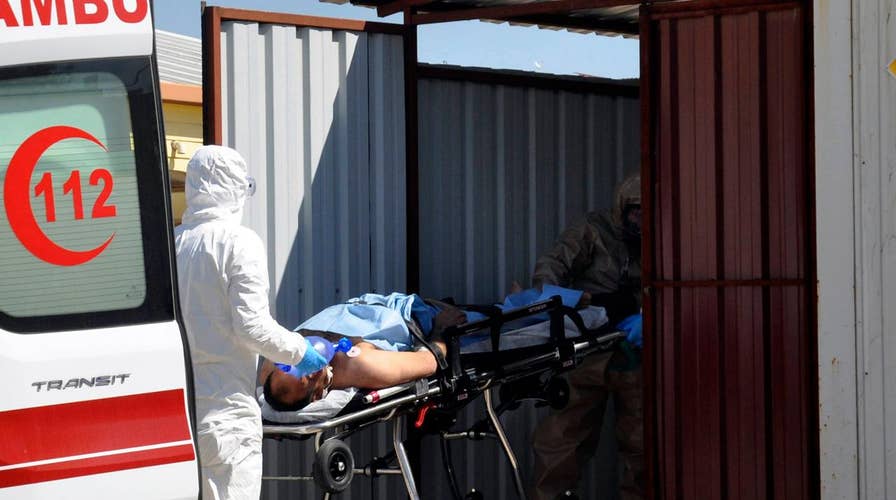 Suspected chemical attack kills dozens in Syria