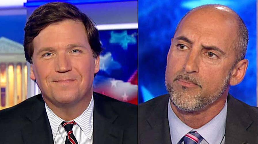 Tucker vs Dem who called him Trump 'smokescreen salesman'