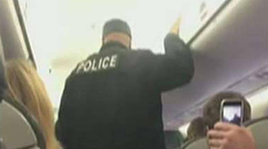 United security officer on leave amid passenger controversy