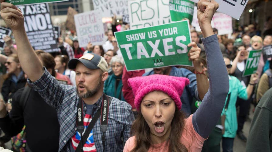 Protesters hold marches across the country on tax day