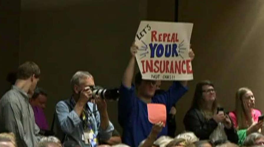 Lawmakers continue to feel the heat at town halls