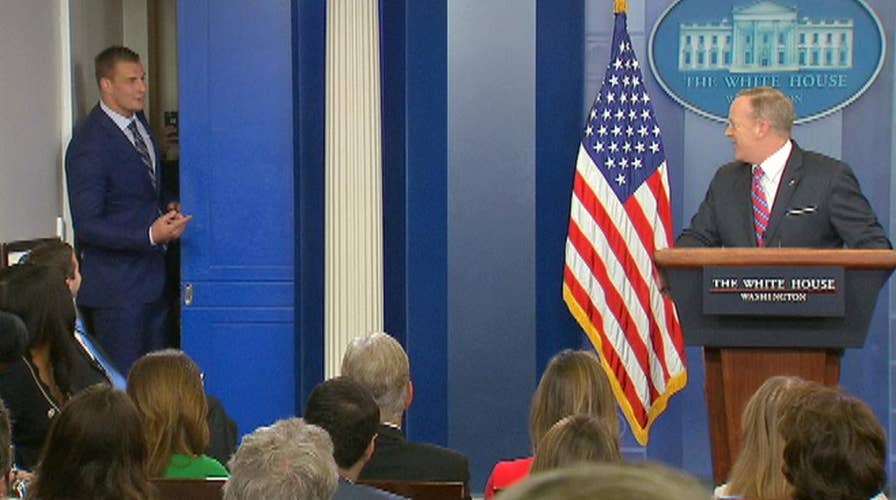 Gronk interrupts press briefing; Spicer: 'That was cool'