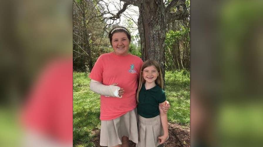 Brave 12-year-old girl saves sister, fights off carjacker