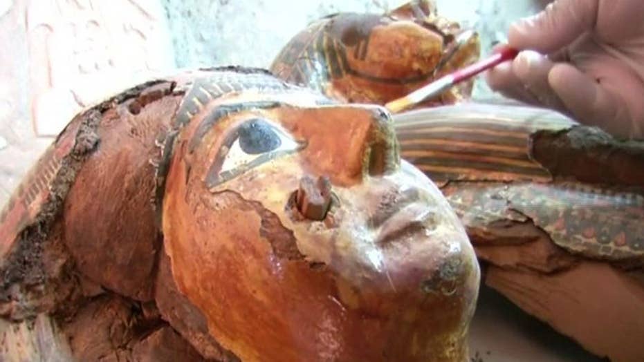 Ancient mummies unearthed in Egyptian tombs