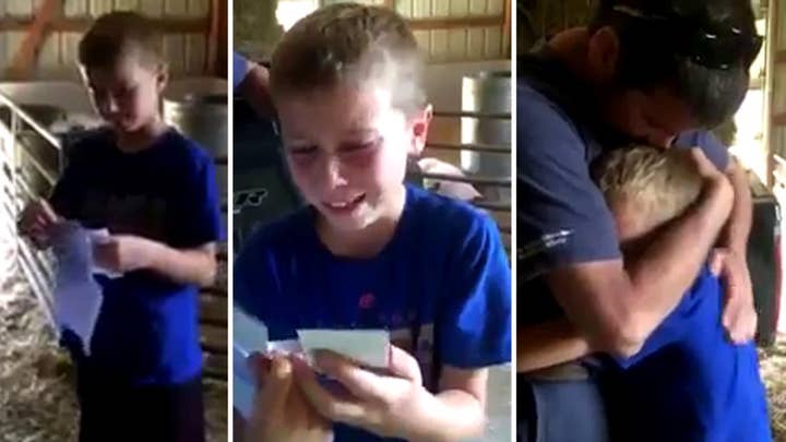 9-year-old loses it when surprised with Cubs tickets 