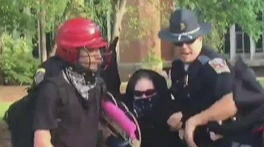 Auburn University enforces 'no mask' rule at protest
