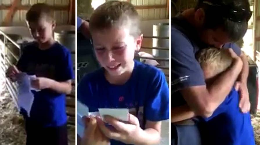 9-year-old loses it when surprised with Cubs tickets