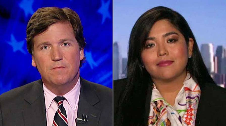 Tucker to author: Why's Trump's wall a symbol of hate?