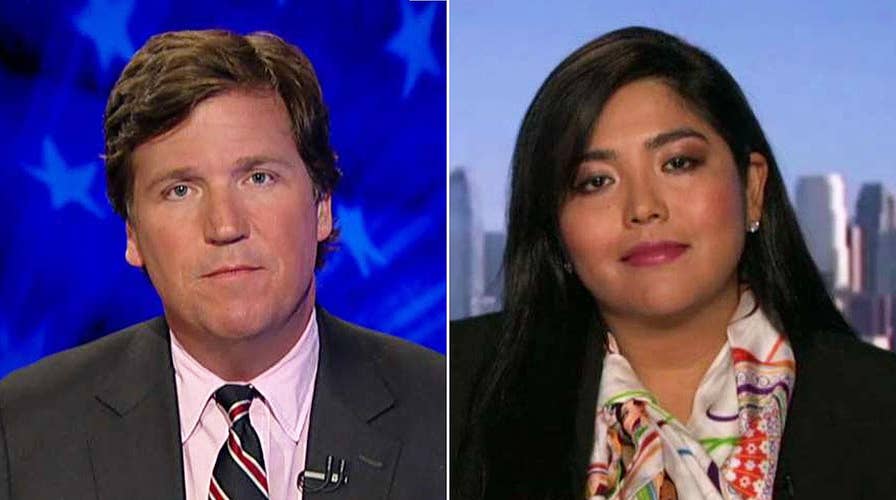 Tucker to author: Why's Trump's wall a symbol of hate?