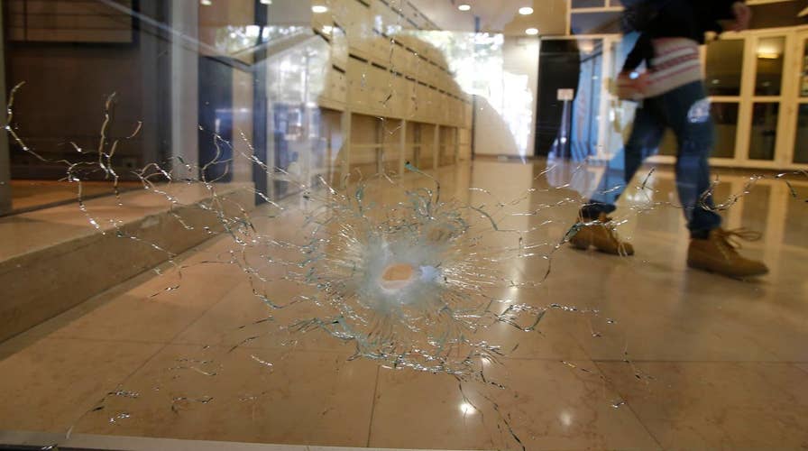 ISIS strikes Paris: Officer killed, 3 injured