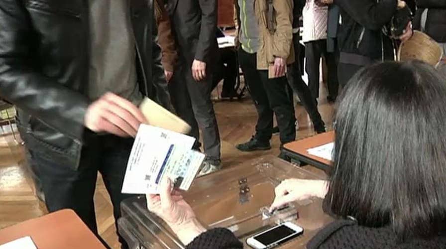 Voter turnout stronger than expected in French election 