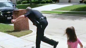 Texas officer shares story behind viral hopscotch video with girl