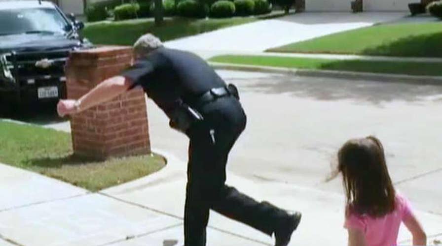 Texas officer skips lunch to hopscotch with little girl